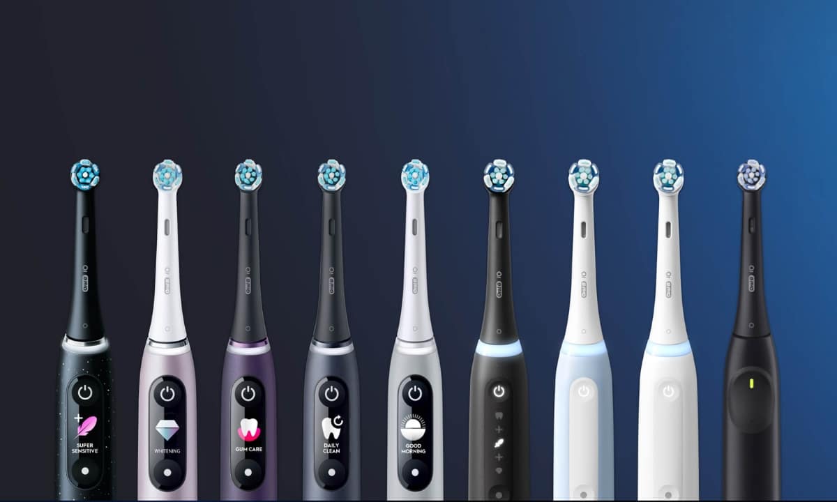 Oral-B electric toothbrushes with sleek designs, lined up in various colors and styles.