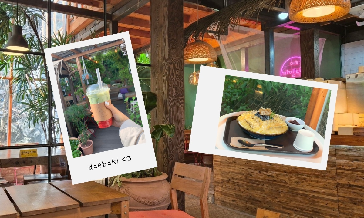 An artsy café surrounded by plants and colorful Polaroid-style photos.
