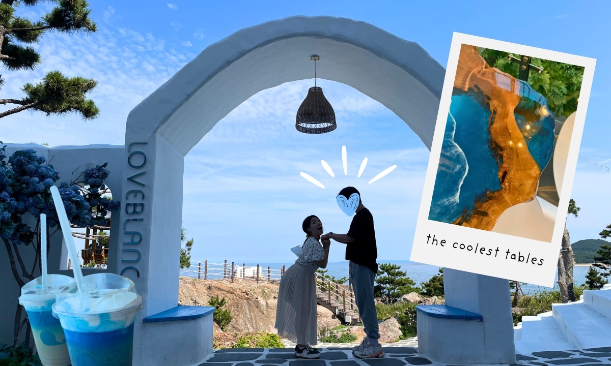 A romantic coastal café near Pohang with a white archway and ocean view. A polaroid photo of the ocean table top and fun blue drinks are collaged on top.
