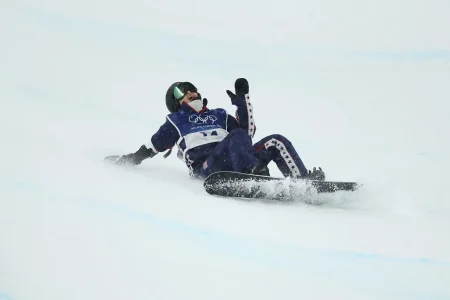 Chloe Kim of Team United States reacts after she crashes in run three of the Women’s Snowboard Halfpipe Final during the Milano Cortina 2026 Winter Olympic games at Livigno Snow Park on Feb. 12, 2026 in Livigno, Italy.