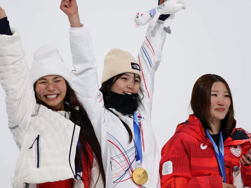 LIVIGNO, ITALY - FEBRUARY 12: Gold medalist Gaon Choi of Team Republic of Korea, Silver medalist Chloe Kim of Team United States and Bronze medalist Mitsuki Ono of Team Japan celebrate during the medal ceremony for the Women’s Snowboard Halfpipe on day six of the Milano Cortina 2026 Winter Olympic games at Livigno Snow Park on February 12, 2026 in Livigno, Italy.