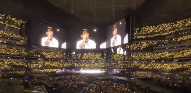 Stadium glowing golden for JK's birthday project.